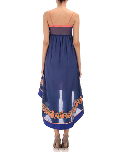 blue assymetrical dress with embroidery.