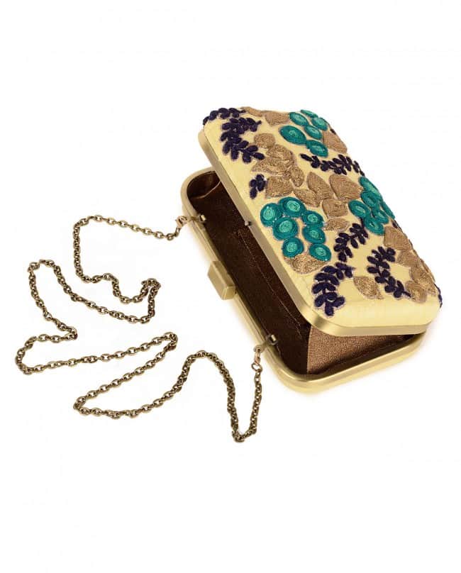 Cream and turquoise fruit embroidered clutch bag