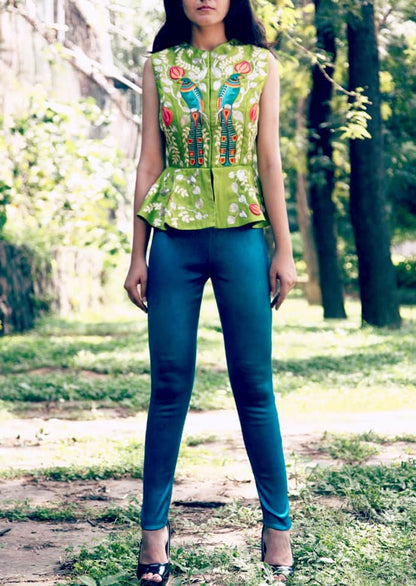 Lime green bird peplum jacket with teal fitted cigarette pants