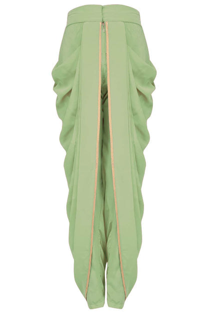 Pale green straight kurta with dhoti pants and ivory net dupatta