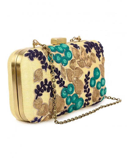 Cream and turquoise fruit embroidered clutch bag