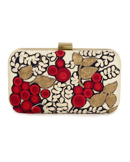 Ivory clutch with red fruit and leaf embroidery