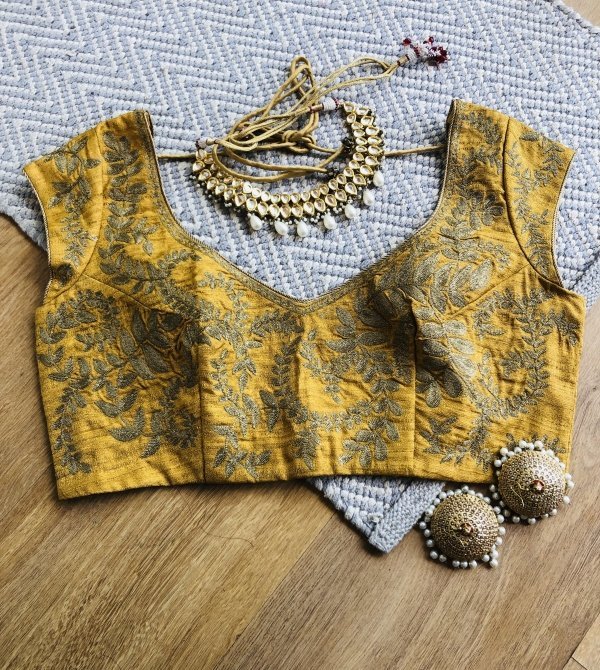 Yellow heavy embroidered blouse