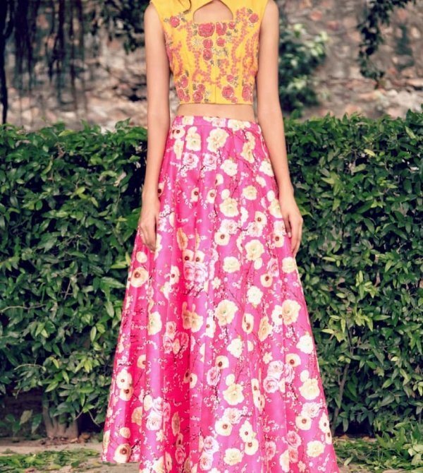 Yellow crop jacket with pink floral printed skirt.